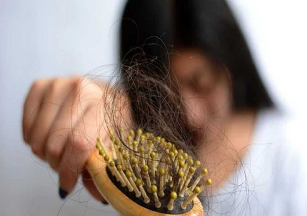 What is hair loss due to disease